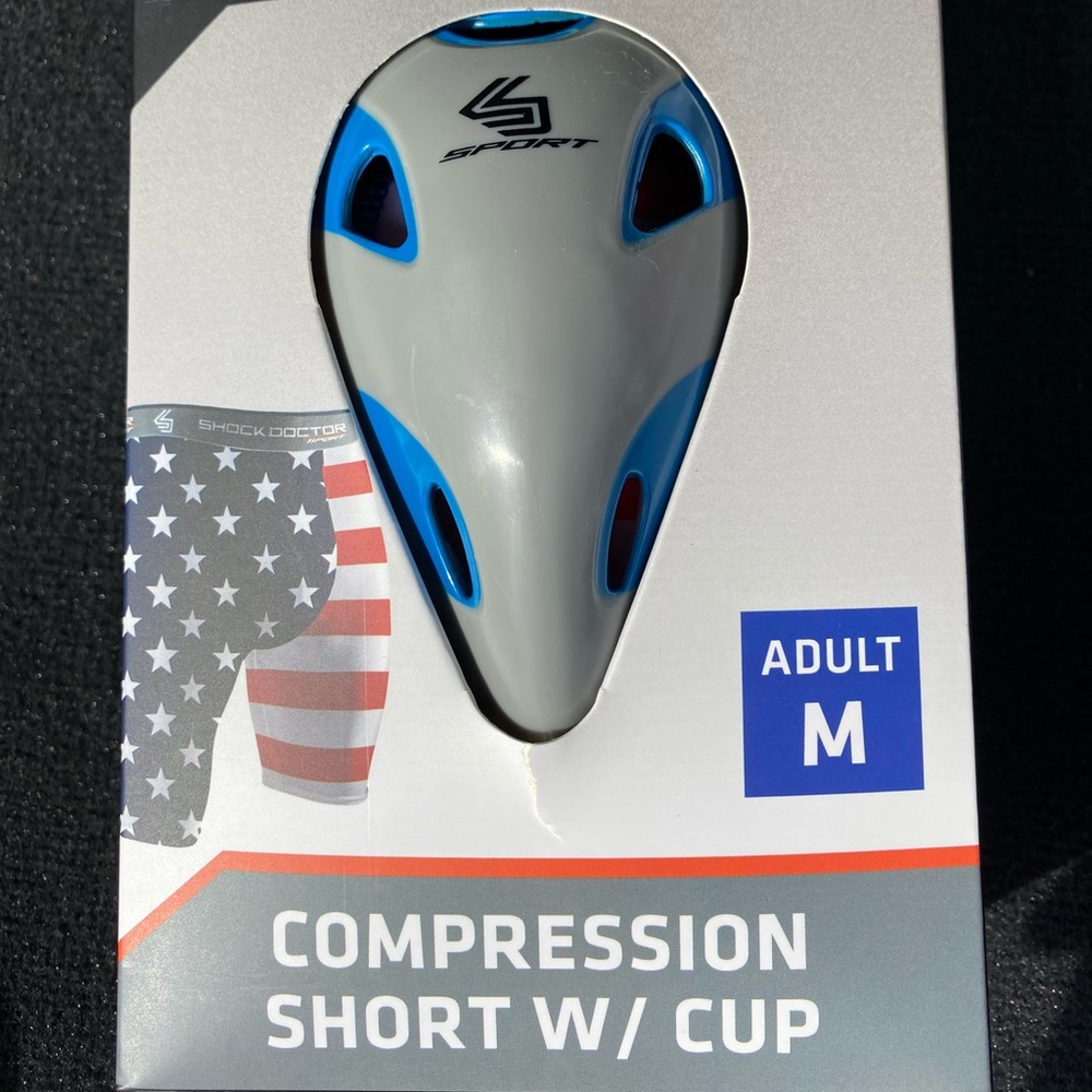 Compression shorts with cup